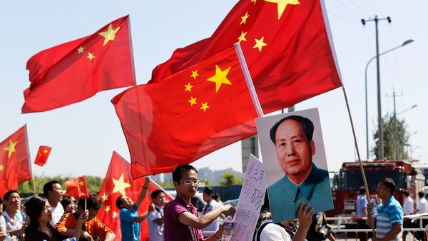 Chinese protestors stage an anti-Japan rally outside the Japan Embassy in Beijing, China