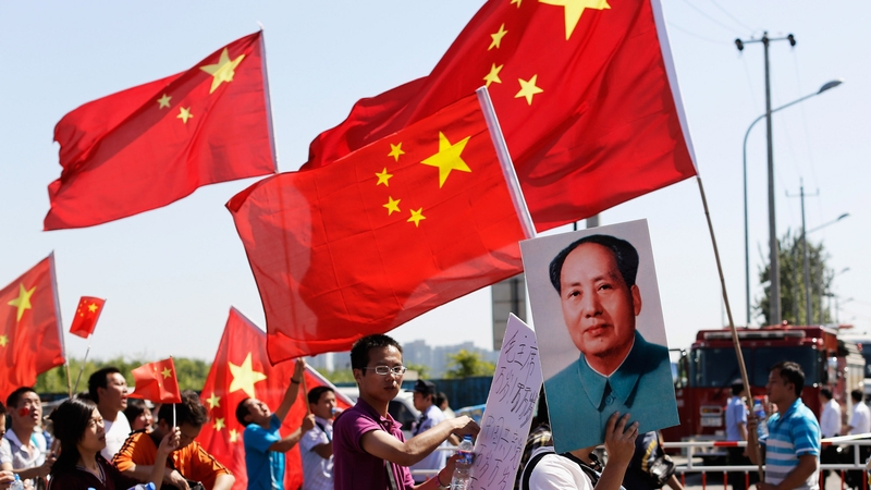 Chinese protestors stage an anti-Japan rally outside the Japan Embassy in Beijing, China