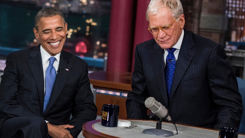 President Obama and David Letterman speak during a break in the taping of the 'Late Show with David Letterman'