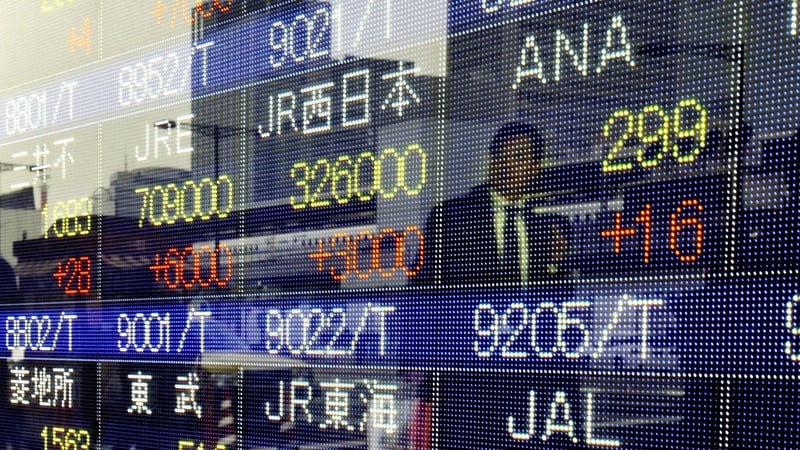 The benchmark Nikkei 225 index at the Tokyo Stock Exchange hit its highest finish since December 1996