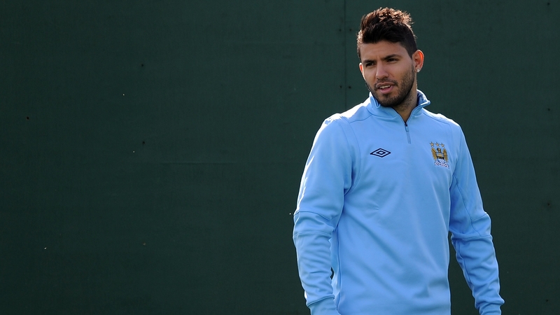 Aguero, seen training at the Bernabeu, was strongly linked with a move to Real before moving to Eastlands in 2011