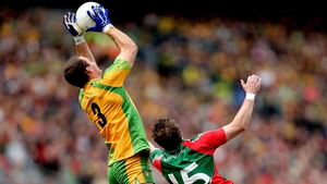 Neil MeGee rises above Michael Conroy of Mayo