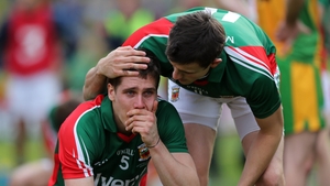 Mayo's Lee Keegan is consoled by team-mate Jason Doherty at the end of the game