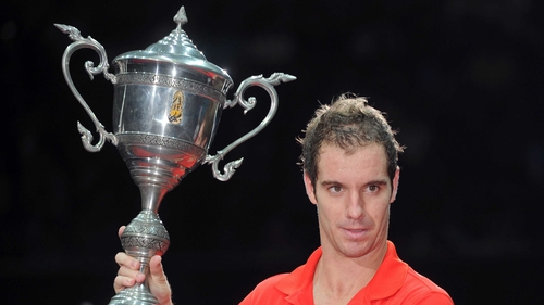 Richard Gasquet shows off the trophy