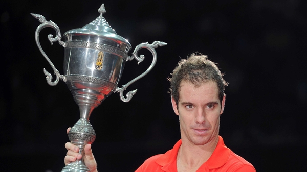 Richard Gasquet shows off the trophy