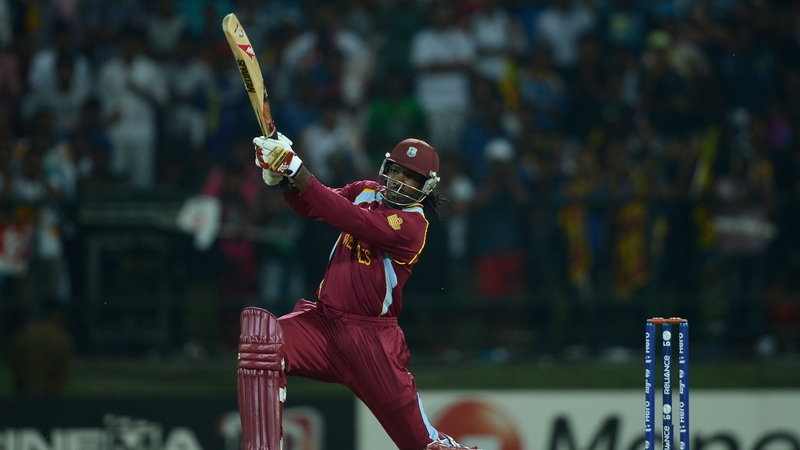 Chris Gayle of the West Indies hits out for six during the Super Over