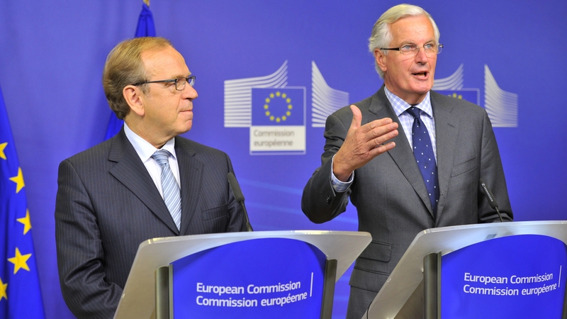 Erkki Liikanen (left) presented the report to Michel Barnier