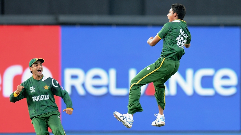 Raza Hasan of Pakistan celebrates the wicket of Shane Watson of Australia