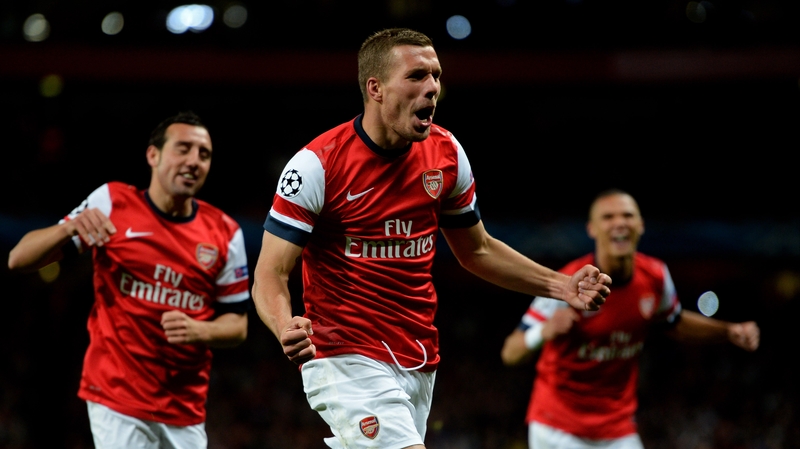 Lukas Podolski celebrates scoring Arsenal's second goal at Emirates Stadium