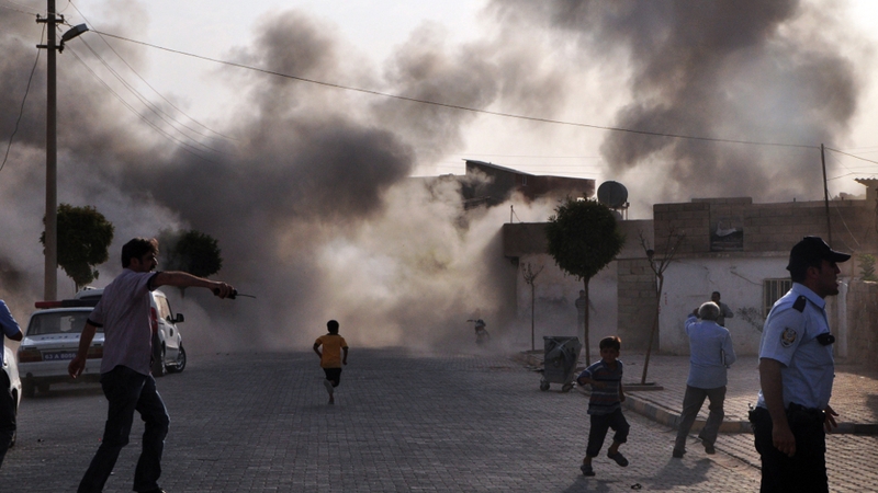 Several Syrian shells crashed inside Akcakale town in Turkey, killing at least five people yesterday