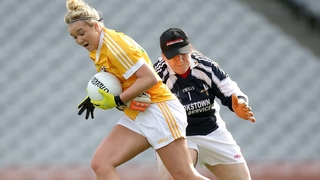 Antrim's Anna Finnegan rounds Louth goalkeeper Una Pearson