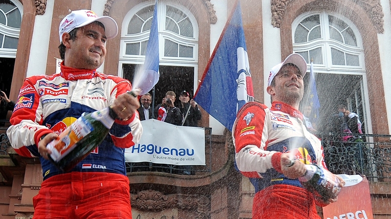 Sebastien Loeb (right) celebrates with co-driver Daniel Elena