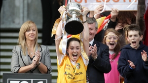 Antrim captain Clare Timoney raises the Junior trophy