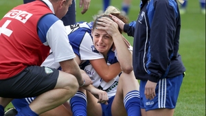 Waterford's Michelle Ryan is comforted by teammates after the Déise's 1-12 to 1-05 defeat