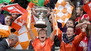 Armagh captain Mags McAlinden raises the Intermediate trophy