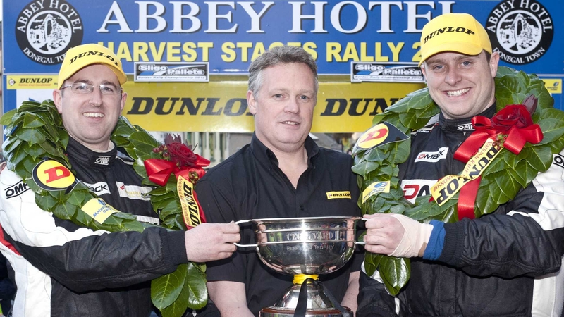 Brian O’Mahony and co-driver John Higgins celebrate their championship victory