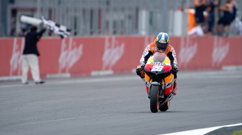 Dani Pedrosa crosses the finish line in Japan