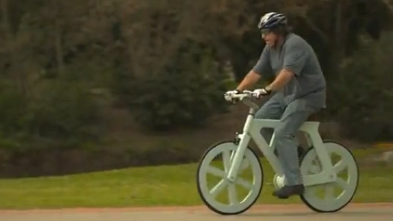 The bicycle is made almost entirely out of cardboard