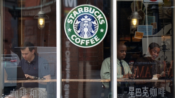 The world's largest coffee chain said global sales at cafes open at least 13 months rose 4% in its fiscal third quarter