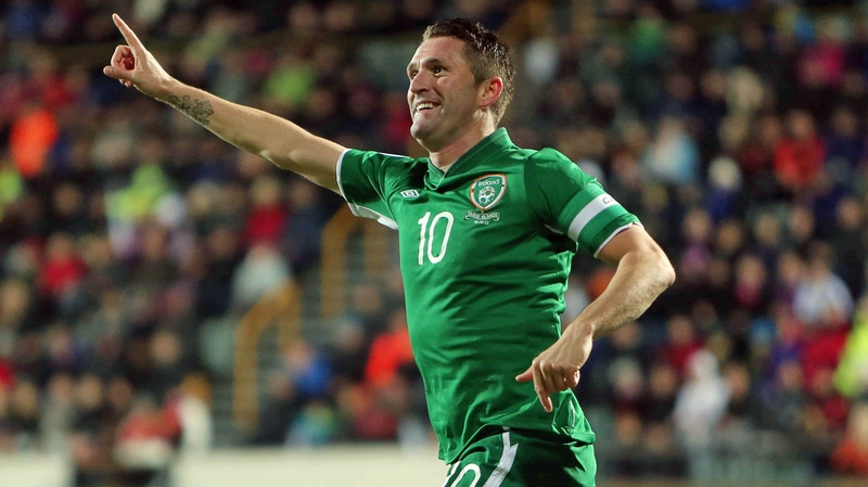 Robbie Keane celebrates Jon Walters' goal