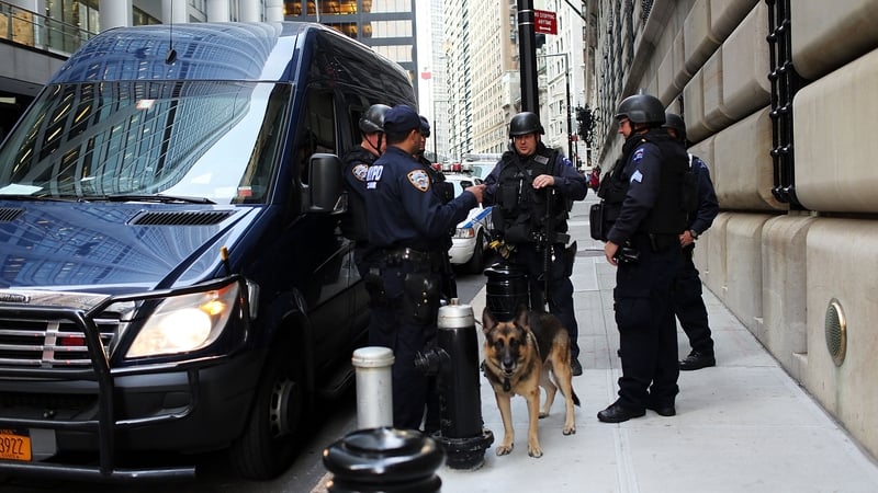 Police outside the Federal Reserve after yesterday's arrest