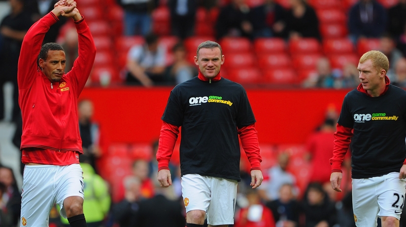 Rio Ferdinand warming up before the Stoke game alongside Wayne Rooney and Paul Scholes