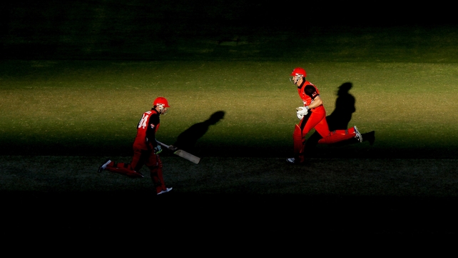 Phillip Hughes and Michael Klinger of the Redbacks run between the wickets during the Ryobi One Day Cup