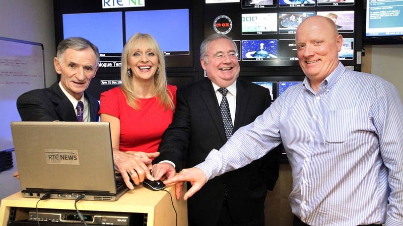 RTÉ Chairman Tom Savage, broadcaster Miriam O'Callaghan, Minister for Communications Pat Rabbitte and Mick Kehoe Executive Director at RTÉ Transmission Networks make the switch