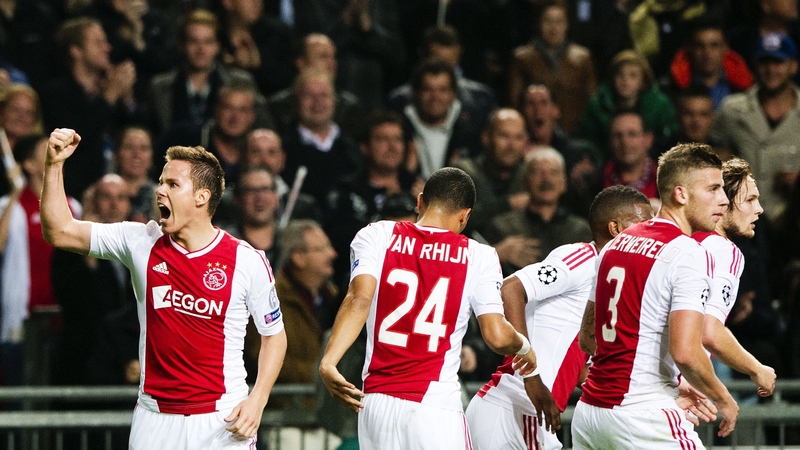 Ajax's Niklas Moisander punches the air after scoring his side's second goal against Manchester City