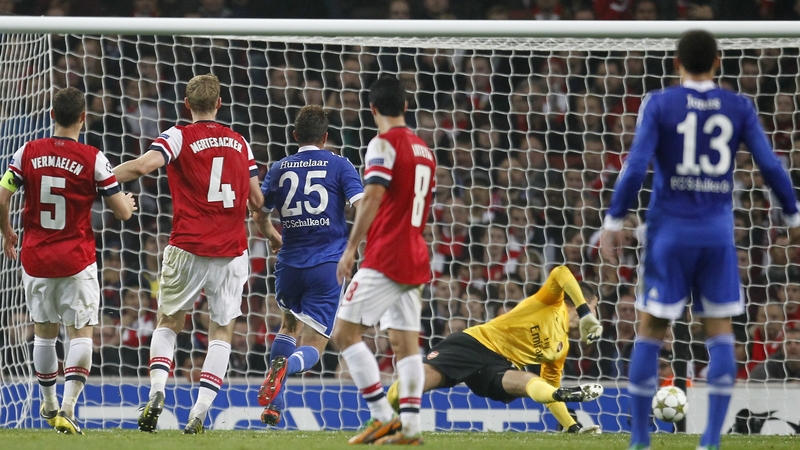Klaas-Jan Huntelaar (No 25) opened the scoring for the visitors in north London
