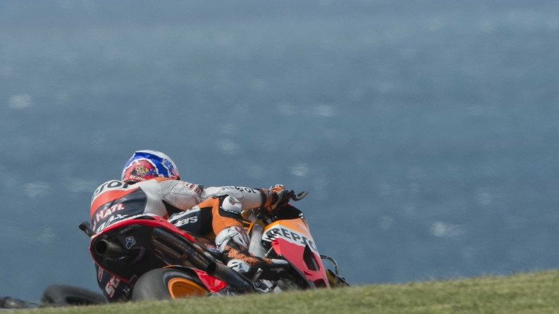 Casey Stoner rounds the bend during practice for the Australian MotoGP