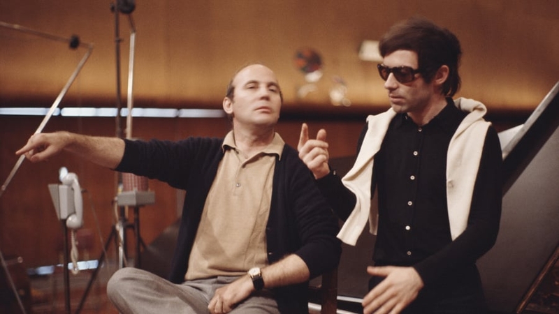 Henze, seen here on the left, wrote 10 symphonies and was especially known for his works for music theatre