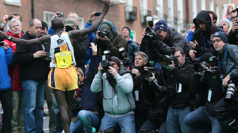 Kenya's Geoffrey Ndungu poses for photographs after a successful defence of his title