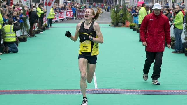 The strain on Maria McCambridge's face was clearly evident as she crossed the finishing line