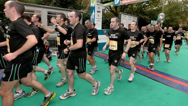 Members of the Irish Air Corps cross the finishing line in formation