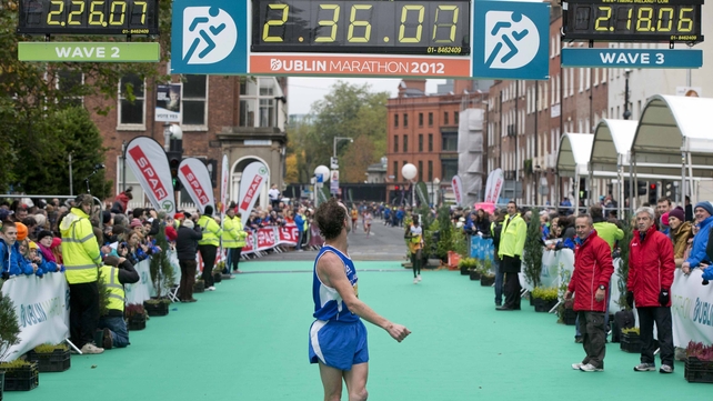 Just checking! Tommy McElwain has a look at his time at the end of 26 miles 385 yards