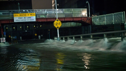 Water rushes into the Carey Tunnel (previously the Brooklyn Battery Tunnel) in New York