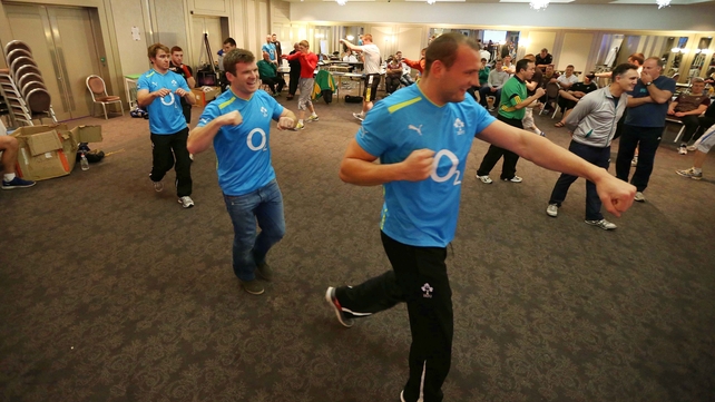Ireland players Eoin Reddan, Gordon D'Arcy and Dan Tuohy warm up with the Ireland boxing squad