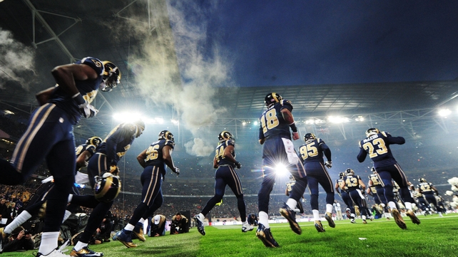 St Louis Rams players take to the field before their NFL clash with the New England Patriots at Wembley Stadium in London