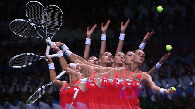 Agnieszka Radwanska serves to Sara Errani at the season-ending TEB BNP Paribas WTA Championships Tennis in Istanbul