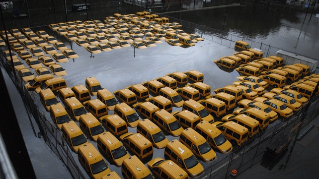 New York taxis sit in a flooded park following flooding from superstorm Sandy