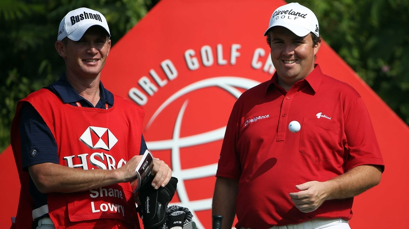 Lowry looking very relaxed with caddie Dermot Byrne enjoying the Chinese sunshine