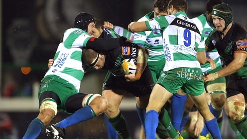 Connacht's Nathan White tries to burst past Corniel Van Zyl of Treviso