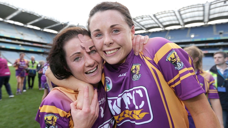 Claire O'Connor and Catherine O'Loughlin celebrate Wexford's third All-Ireland in a row