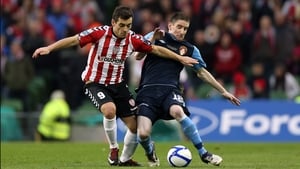 David McDaid of Derry challenges Ian Bermingham of Pat's