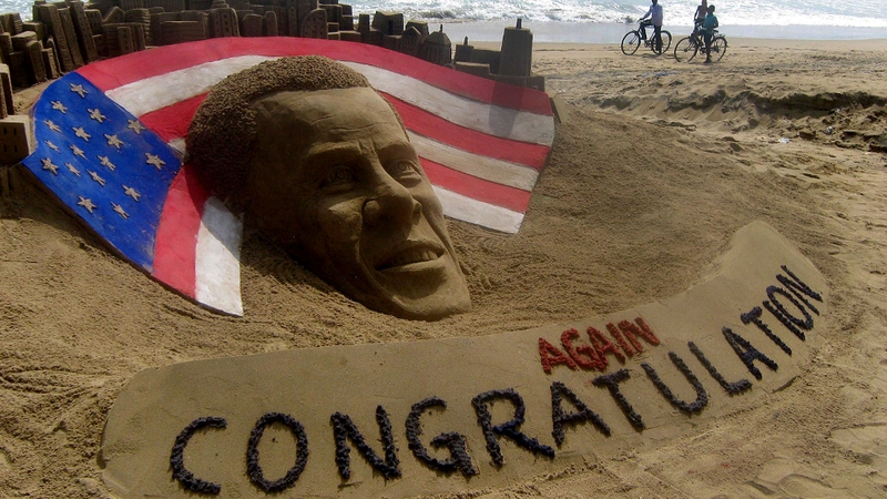 A sand sculpture on Puri beach in India congratulates the US president