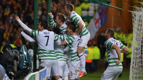 Celtic players celebrate Victor Wanyama's opener in front of their fans