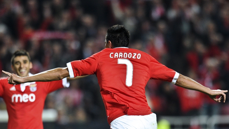 Oscar Cardozo's second-half double against Spartak Moscow was enough to provide Benfica with their first group stage win