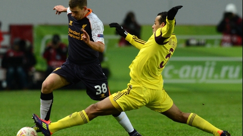 Joao Carlos tackles Liverpool's Adam Morgan