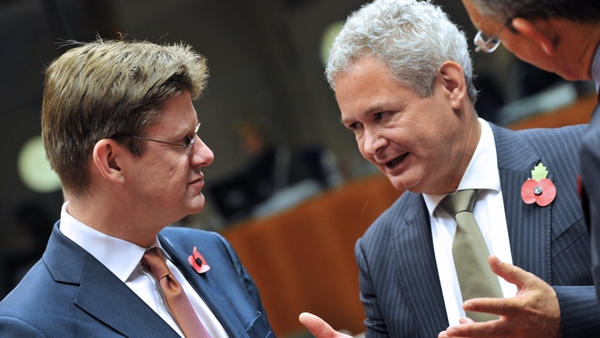 UK Financial Secretary to the Treasury Greg Clark and Cypriot Deputy Minister to the President for European Affairs Andreas Mavroyiannis chat before today's meeting